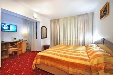 Фото номера Двухместный номер с 1 кроватью Отель Hotel Dobru г. Слэник-Молдова 9